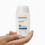 کرم ضد آفتاب رنگی فلوئیدی بایودرما PHOTODERM XDEFENSE ULTRA-FLUID SPF50 شماره 02 حجم 40 میلی لیتری